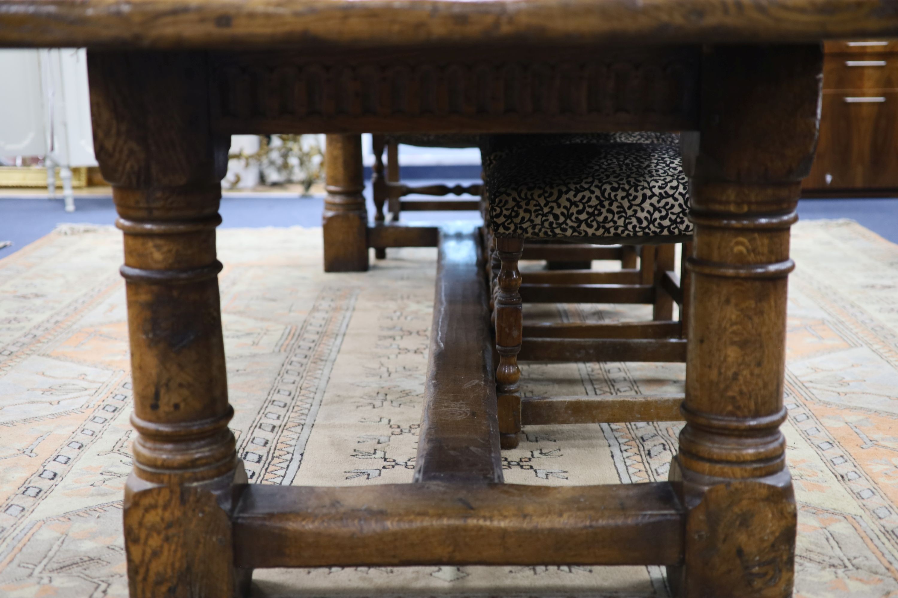 An 18th century style pale oak refectory dining table, length 305cm, depth 90cm, height 76cm